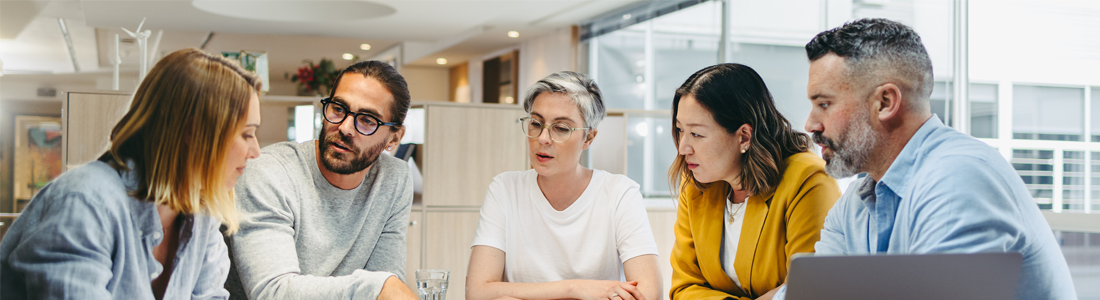 Designer sharing ideas during a meeting.